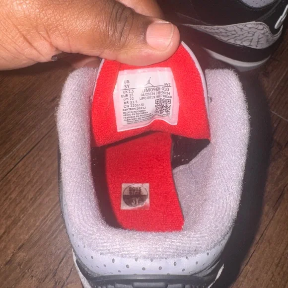 Jordan Kids Black and White Sneakers with Red Accents